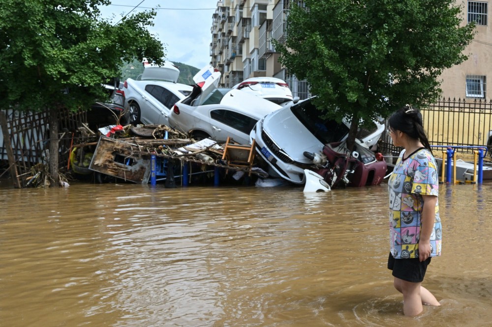 Đô thị hóa nhanh khiến các thành phố của Trung Quốc dễ bị ngập lụt. Ảnh: AFP